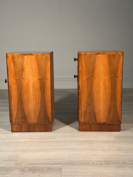 A Pair Of Art Deco Walnut Bedside Cabinets