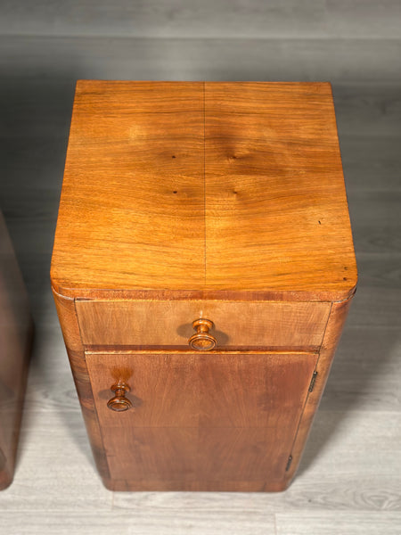 A Pair Of Art Deco Walnut Bedside Cabinets