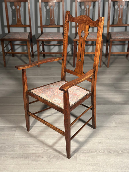 A Set Of Six Pure Arts And Crafts Oak Dining Chairs