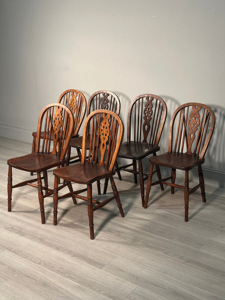 A Set of 6 19th Century Wheelback Dining Chairs