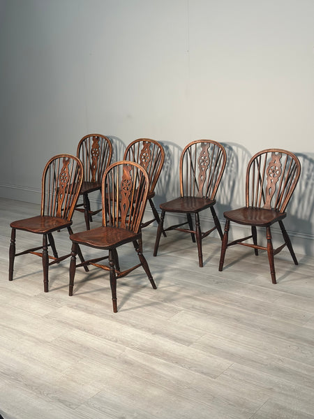 A Set of 6 19th Century Wheelback Dining Chairs