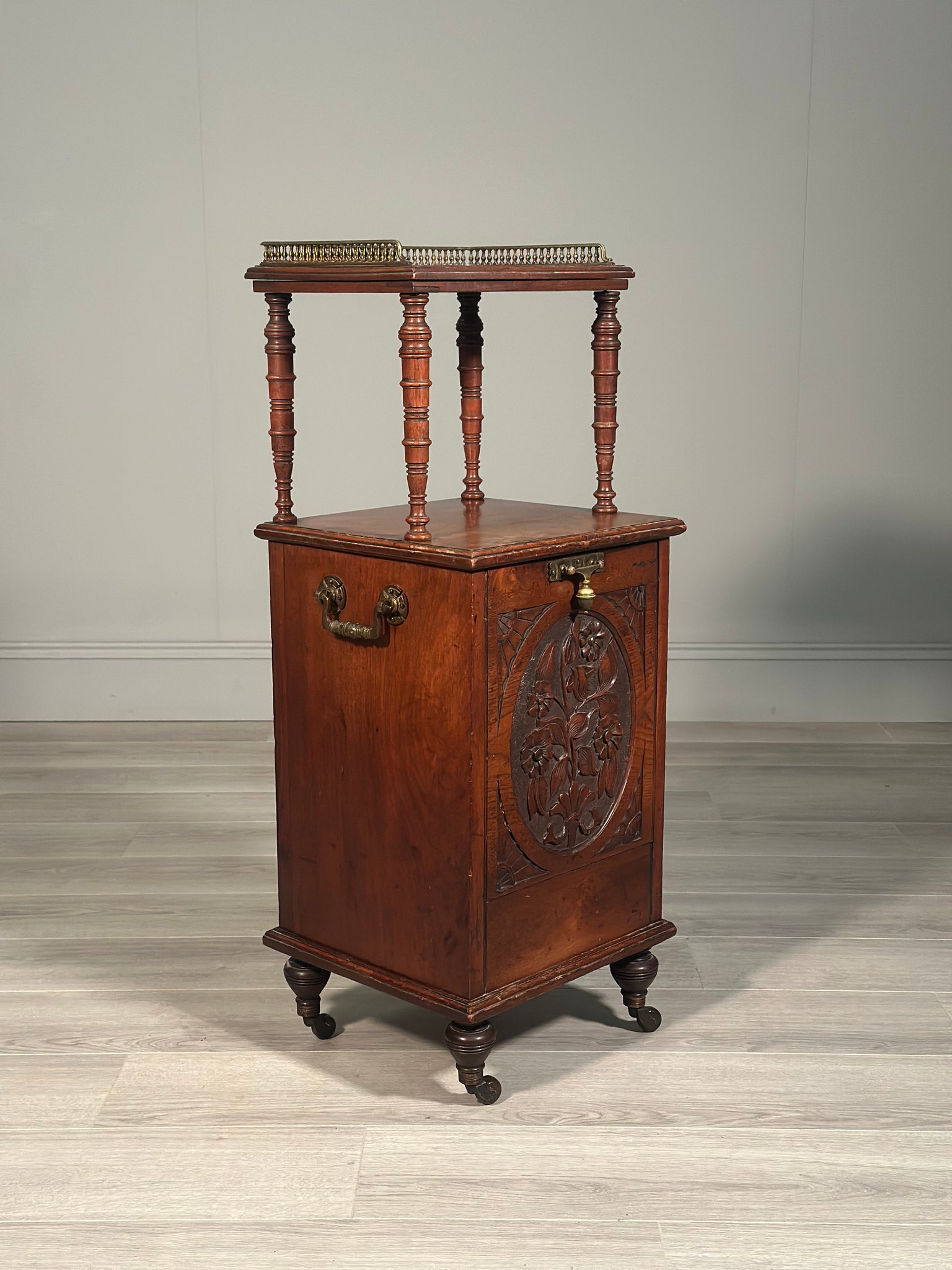 A Late Victorian Aesthetic Movement Mahogany Fireside Purdonium