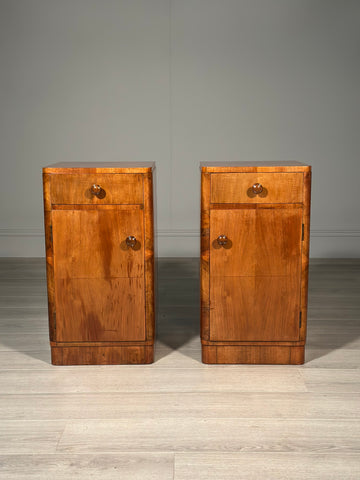 A Pair Of Art Deco Walnut Bedside Cabinets