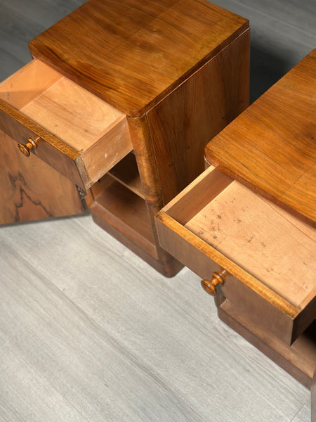 A Pair Of Art Deco Walnut Bedside Cabinets