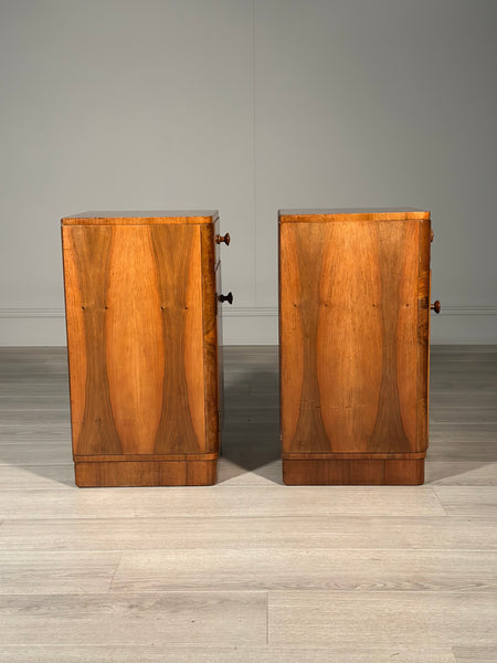 A Pair Of Art Deco Walnut Bedside Cabinets