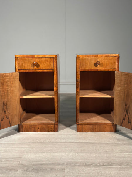 A Pair Of Art Deco Walnut Bedside Cabinets