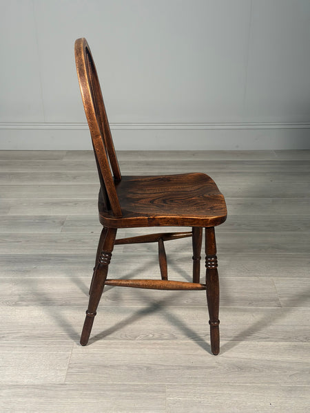 A Set of 6 19th Century Wheelback Dining Chairs