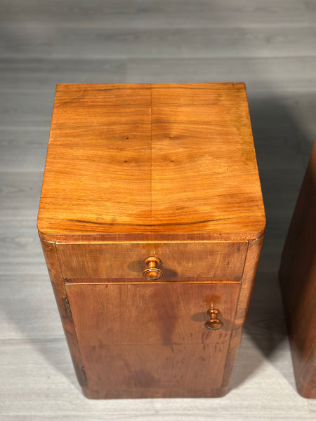 A Pair Of Art Deco Walnut Bedside Cabinets
