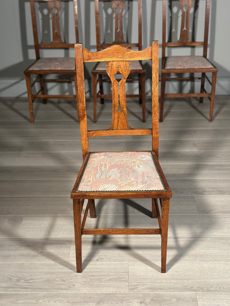 A Set Of Six Pure Arts And Crafts Oak Dining Chairs