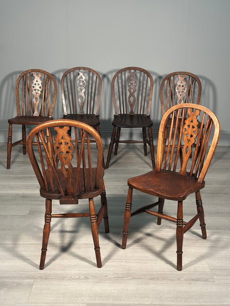 A Set of 6 19th Century Wheelback Dining Chairs