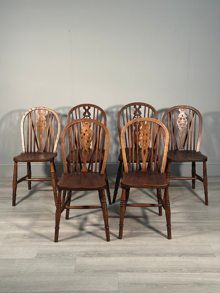 A Set of 6 19th Century Wheelback Dining Chairs