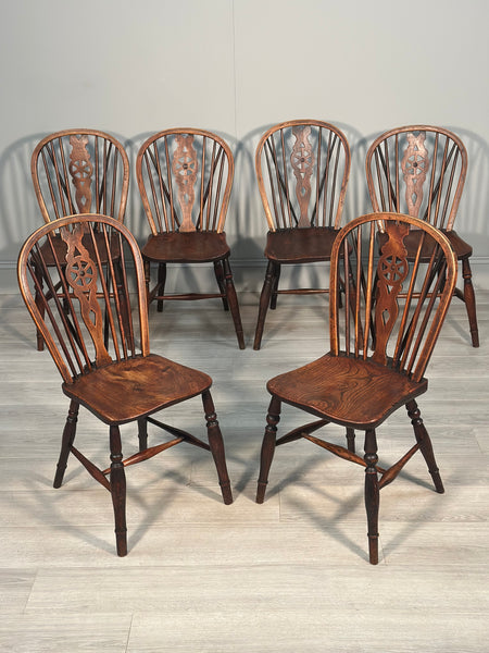 A Set of 6 19th Century Wheelback Dining Chairs