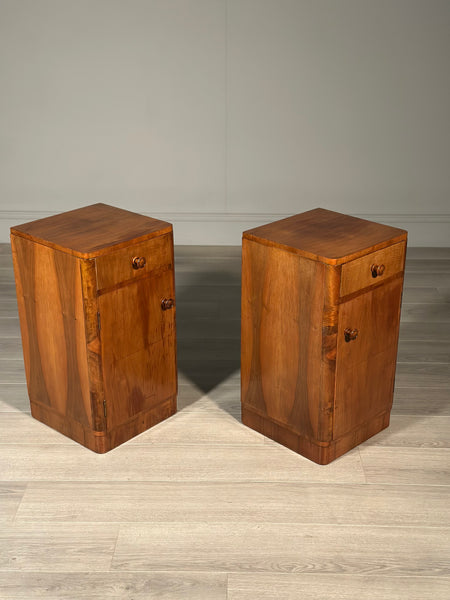 A Pair Of Art Deco Walnut Bedside Cabinets
