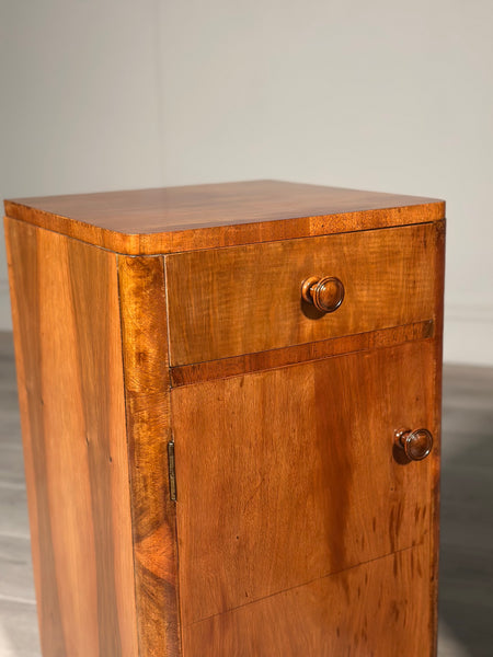 A Pair Of Art Deco Walnut Bedside Cabinets