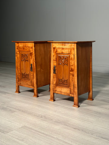 A Pair Of Arts And Crafts Fiddle Back Maple Bedside Cabinets