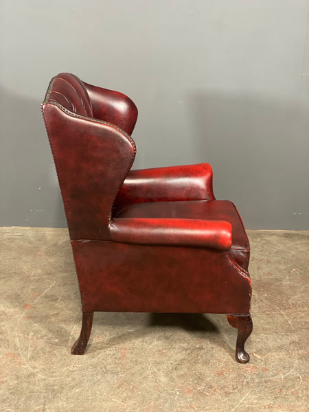 A Petite Chesterfield Wing Back Armchair