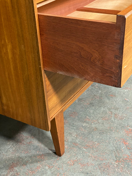 A Younger Walnut Chest Of Drawers by John Herbert