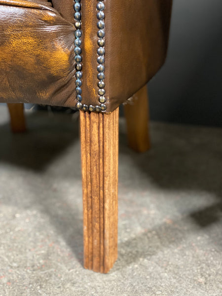 A Pair Of Vintage Chesterfield Tub Chairs
