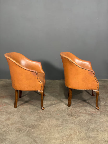 A Pair of Vintage Tub Chairs