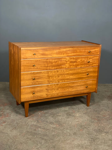A Younger Walnut Chest Of Drawers by John Herbert