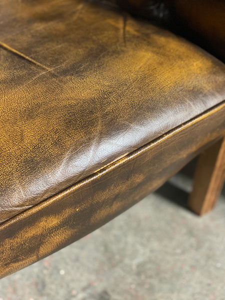 A Pair Of Vintage Chesterfield Tub Chairs