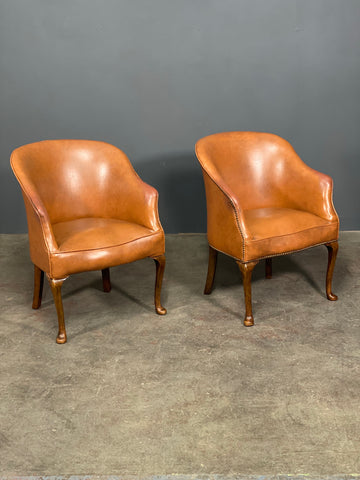 A Pair of Vintage Tub Chairs