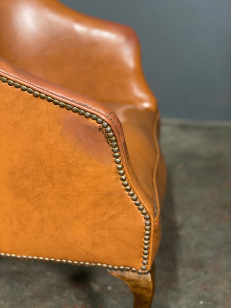 A Pair of Vintage Tub Chairs