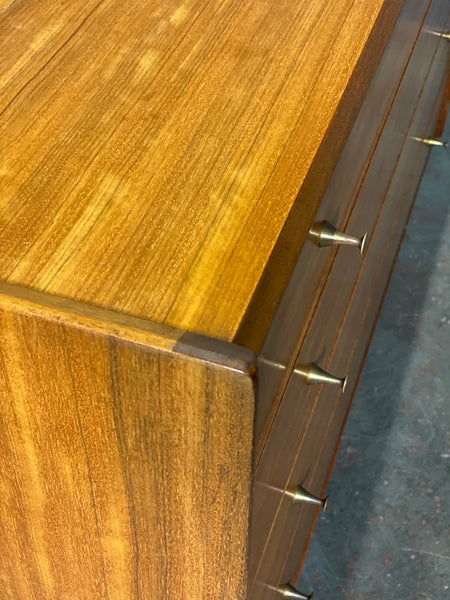A Younger Walnut Chest Of Drawers by John Herbert