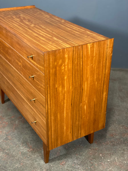 A Younger Walnut Chest Of Drawers by John Herbert