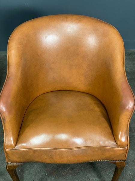 A Pair of Vintage Tub Chairs