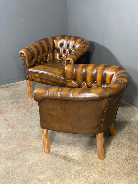 A Pair Of Vintage Chesterfield Tub Chairs