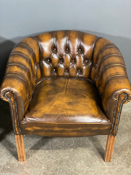 A Pair Of Vintage Chesterfield Tub Chairs
