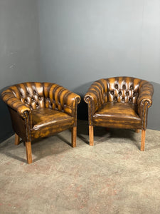 A Pair Of Vintage Chesterfield Tub Chairs