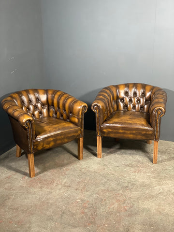 A Pair Of Vintage Chesterfield Tub Chairs