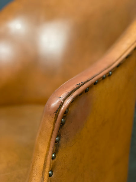 A Pair of Vintage Tub Chairs