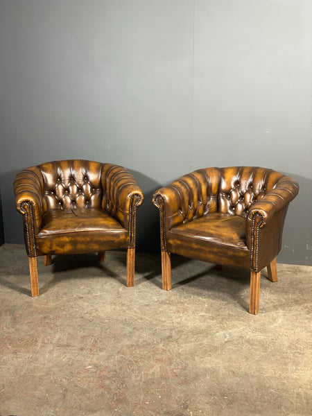 A Pair Of Vintage Chesterfield Tub Chairs