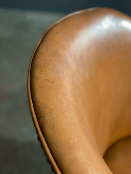 A Pair of Vintage Tub Chairs