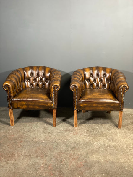 A Pair Of Vintage Chesterfield Tub Chairs