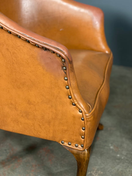 A Pair of Vintage Tub Chairs