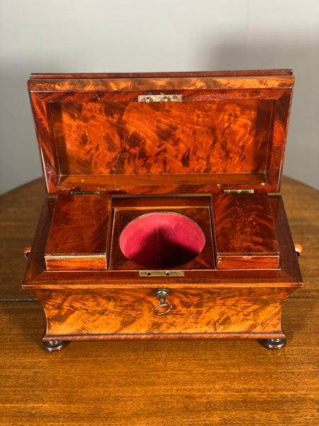 A Georgian Mahogany Tea Caddy By George Simpson Of London