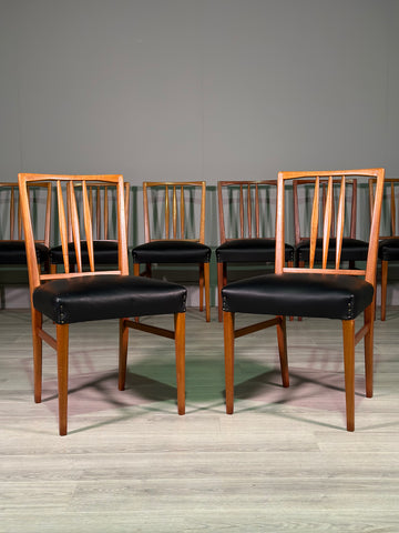 A Set Of 8 Gordon Russell Teak Dining Chairs