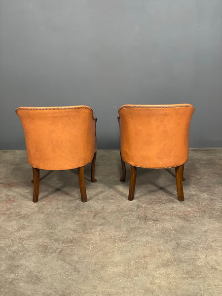 A Pair of Vintage Tub Chairs