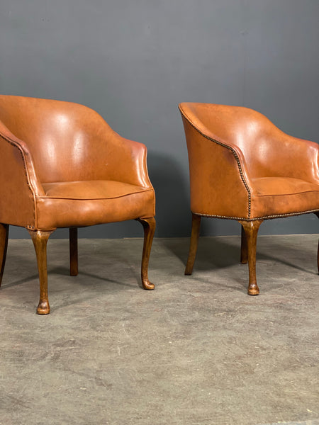 A Pair of Vintage Tub Chairs