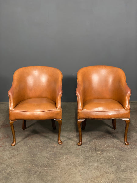 A Pair of Vintage Tub Chairs